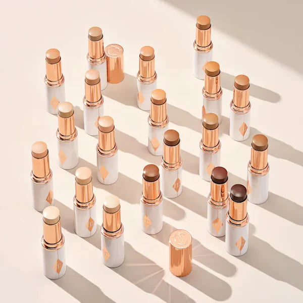 Charlotte Tilbury Unreal Skin Sheer Glow Tint Hydrating Foundation Stick all shades primary image 