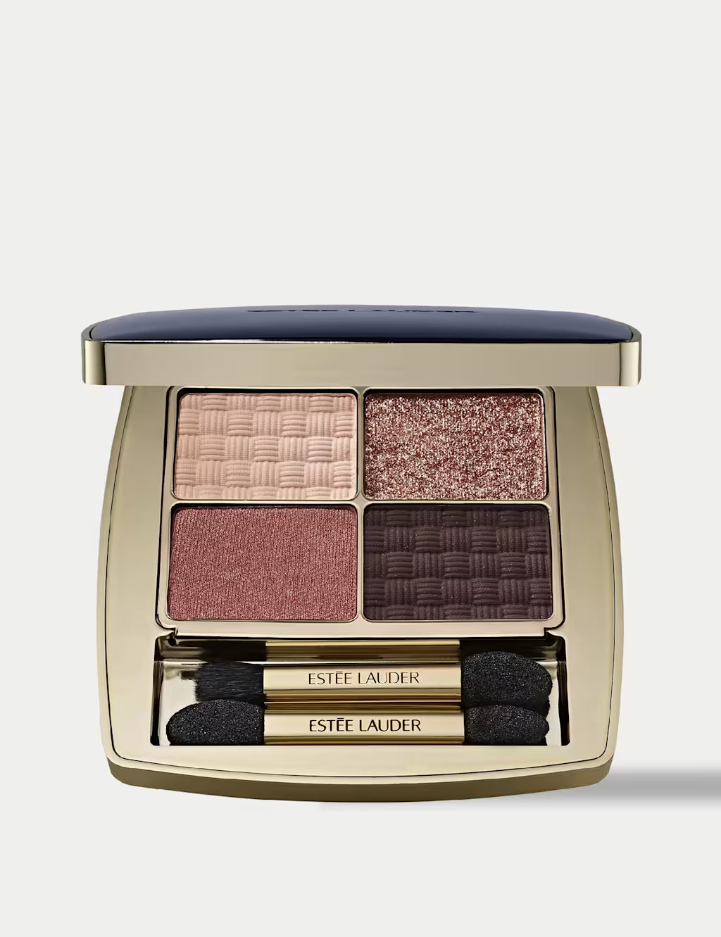 Estée Lauder Quad Eyeshadow Power Brunch palette in a gold compact with a navy blue lid, shown open to reveal four shades: champagne, shimmery rose gold, mauve, and deep plum, with two applicators below.