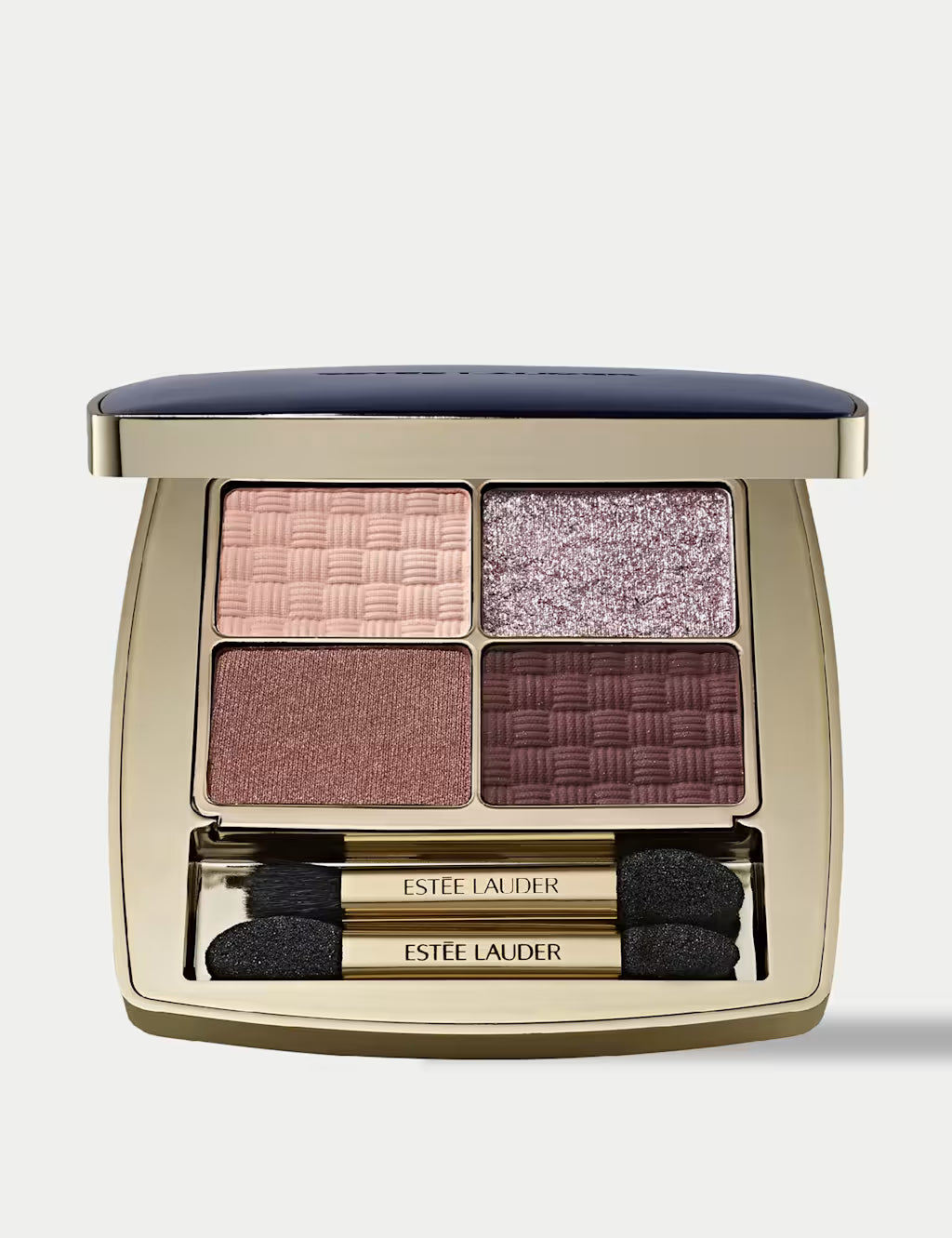 Estée Lauder Quad Eyeshadow Prenup Palette in a gold-toned compact with a navy blue lid, featuring four textured eyeshadow pans in pink, lavender, mauve, and plum, with two applicators below.